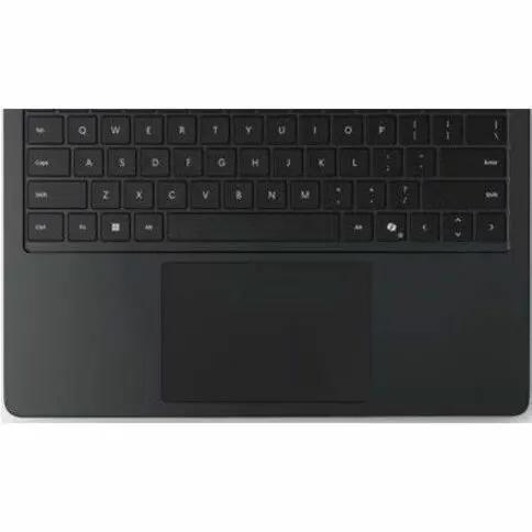 Microsoft Surface Laptop 7 top-down view of black graphite keyboard and touchpad