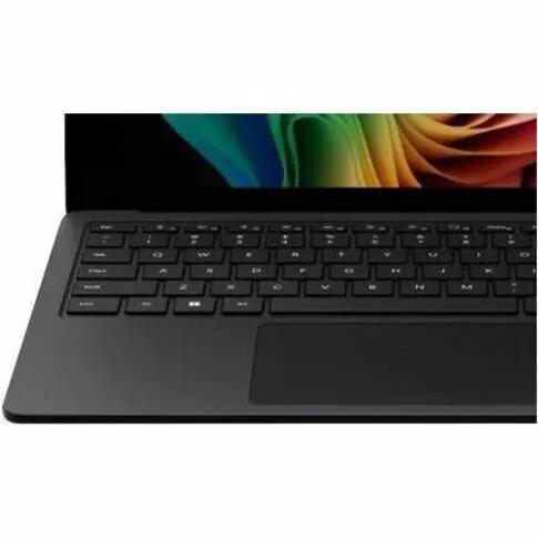 Microsoft Surface Laptop 7 graphite laptop keyboard and touchpad with colorful display