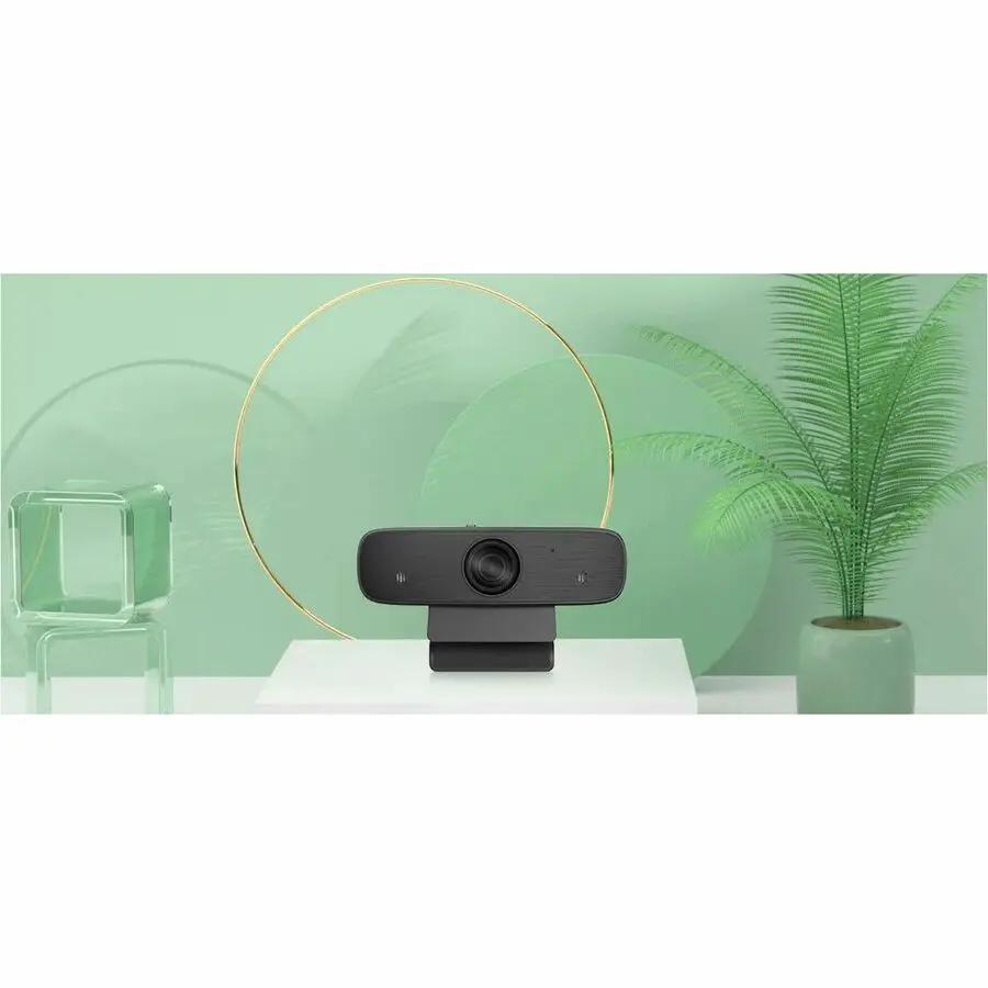 ROCWARE RC19 webcam, black, on a small stand atop a white table