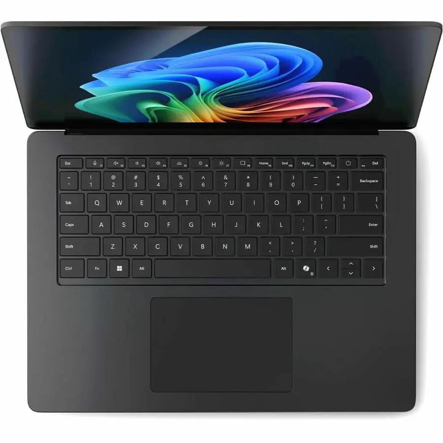Microsoft Surface Laptop 7 15-inch touchscreen laptop, dark gray, top-down view showing keyboard and screen.