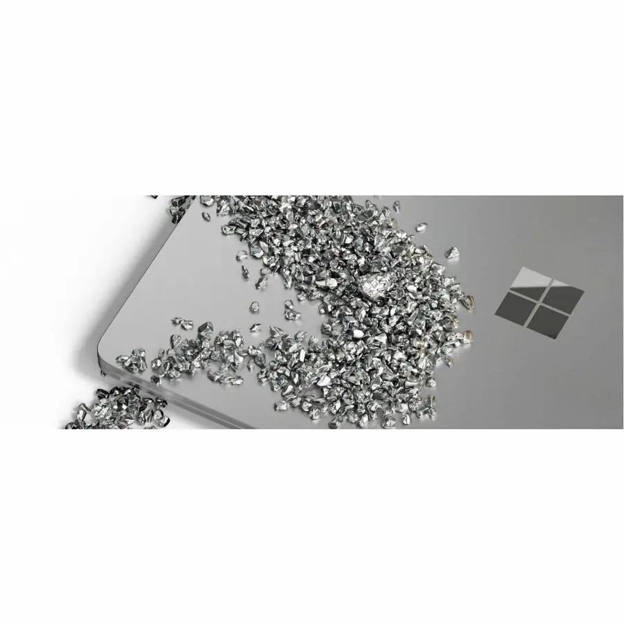 Microsoft Surface Laptop 7 silver laptop with crystal lid embellishments and Windows logo