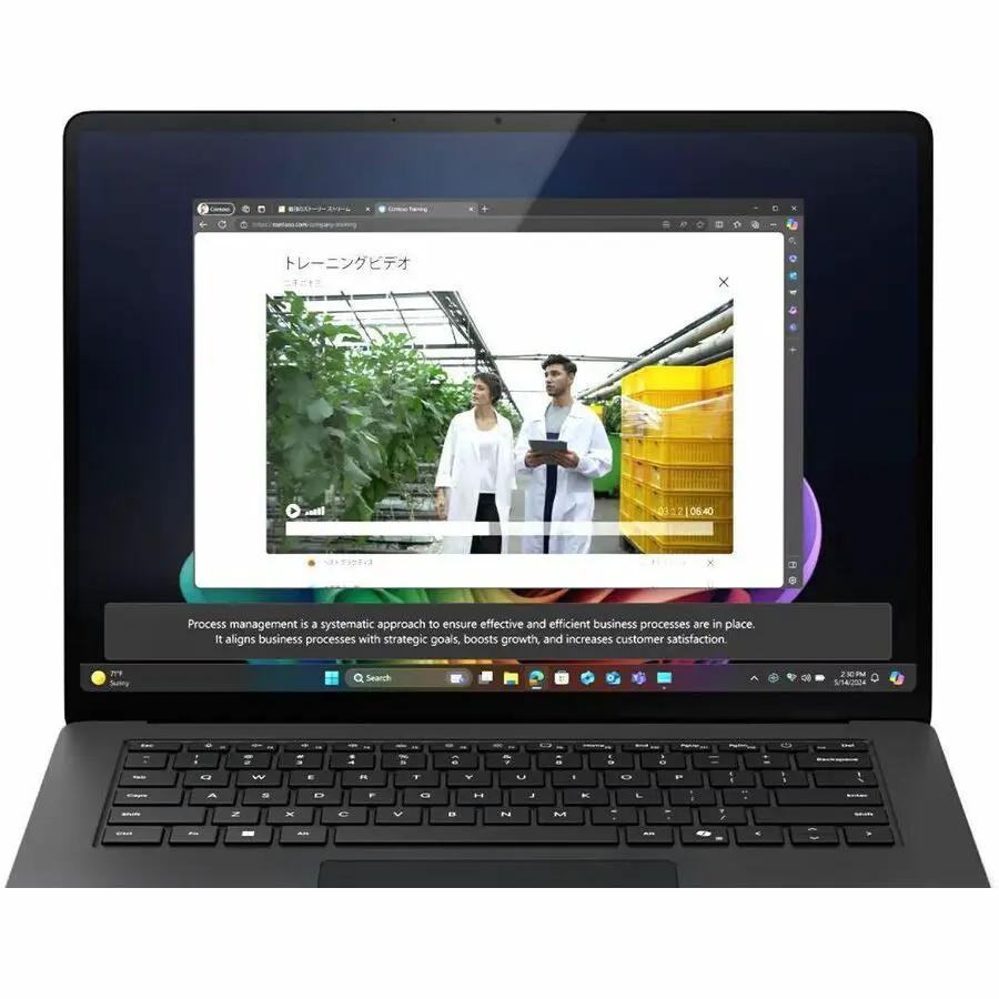 Microsoft Surface Laptop 7, black aluminum body, 15-inch touchscreen.