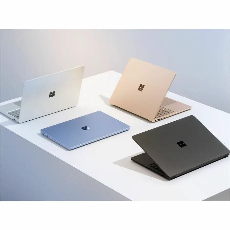 Microsoft Surface Laptop 7 – 4 laptops in silver, blue, gold, and black (open/closed display)