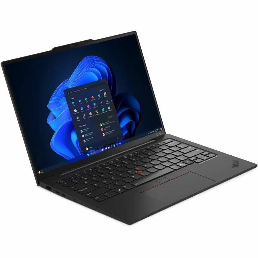 Lenovo ThinkPad X1 Carbon Ultrabook open on desk; black chassis with Windows desktop on screen