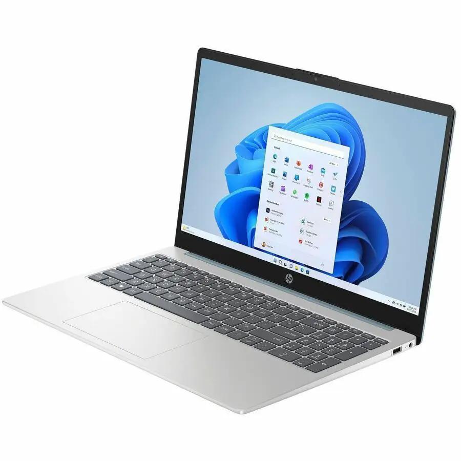 HP 15 Notebook laptop in silver finish with Windows desktop on screen