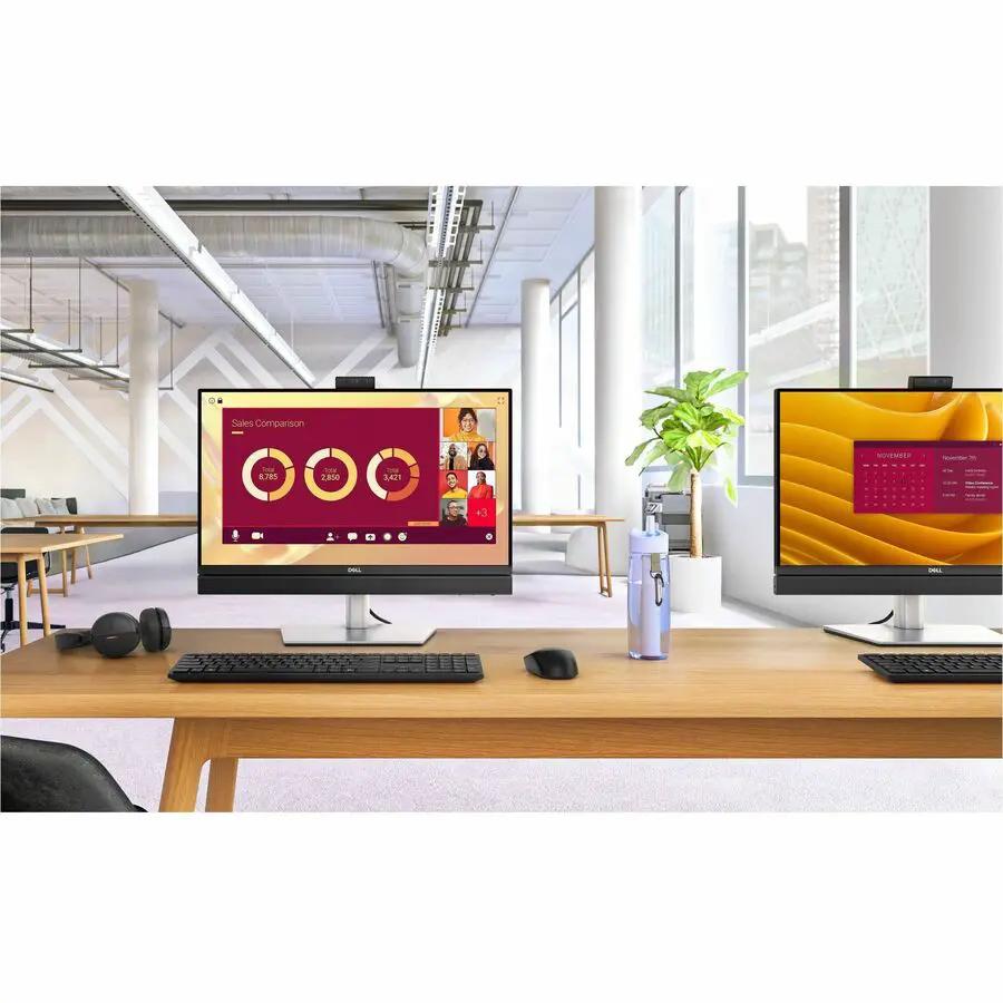 Two Dell QB24250 All-in-One PCs on a wooden desk with keyboards and mice; 32GB RAM, 512GB NVMe.