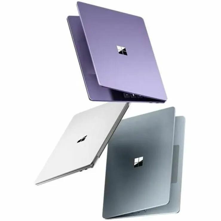Microsoft Surface Copilot Plus Notebook laptops in purple, white and blue-silver (set of 3) with Microsoft logo