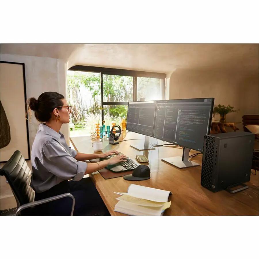 HP EliteDesk 8 G1i Desktop SFF on a wooden desk with dual monitors in an office setup.