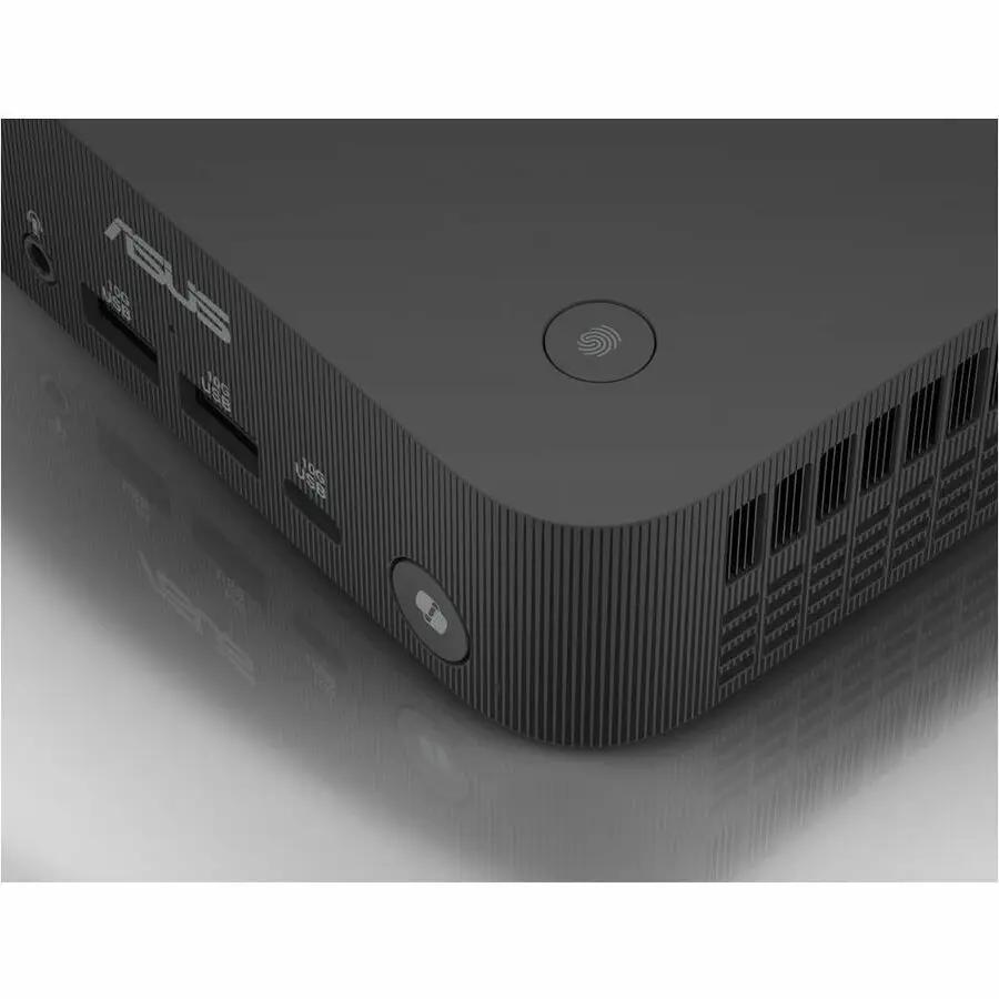 ASUS ExpertCenter PN54 Mini PC back view with USB ports, vents, and circular power button