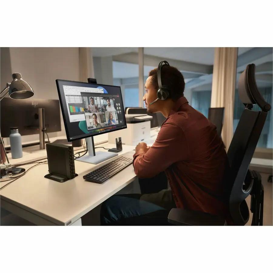 HP EliteDesk 8 Mini G1i Desktop - black mini PC on an office desk beside monitor and keyboard