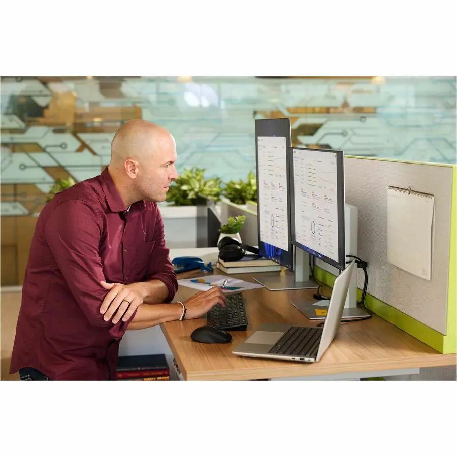 HP EliteBook 14 AI Laptop, silver, 64GB RAM and 1TB SSD on a desk with dual monitors