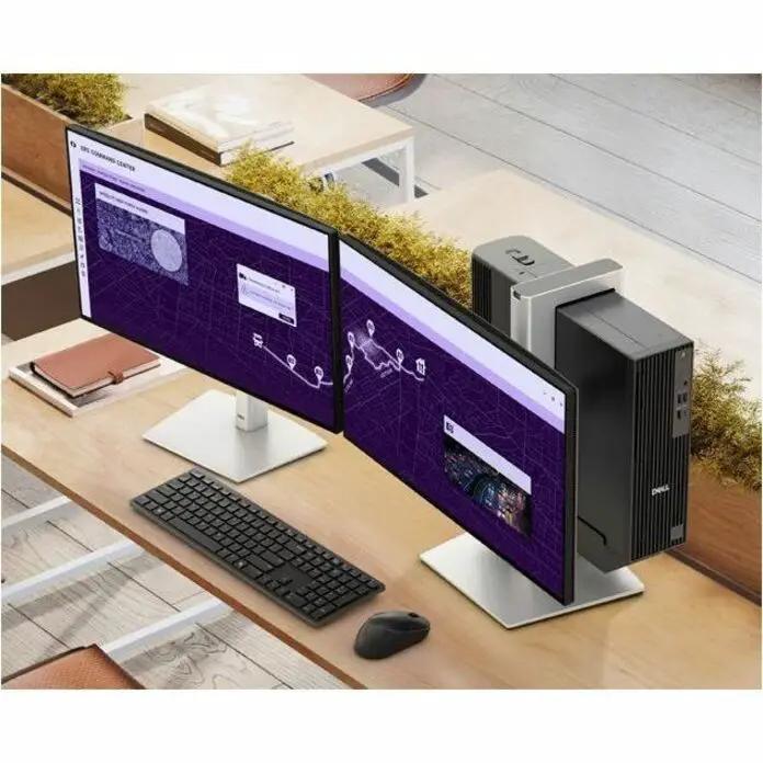 Dell Pro Slim QCS1250 Mini PC with black finish and dual monitors
