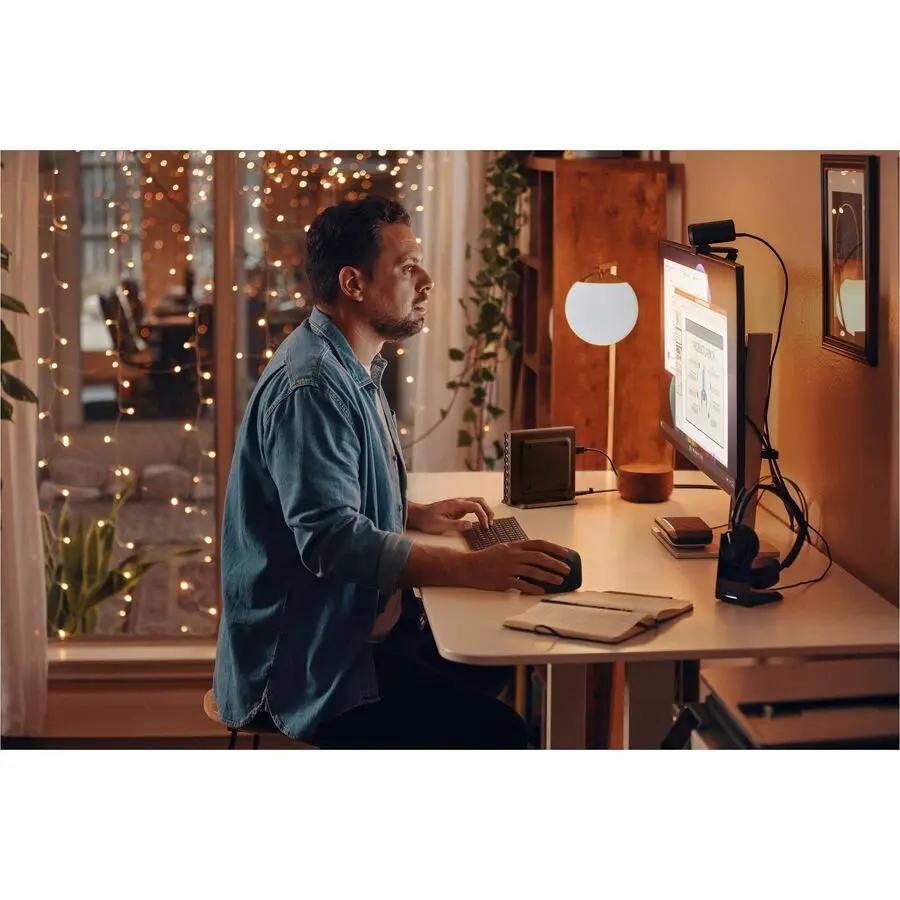HP EliteDesk 800 G1aAI Mini PC on a white desk with monitor, keyboard, and mouse in a home office.