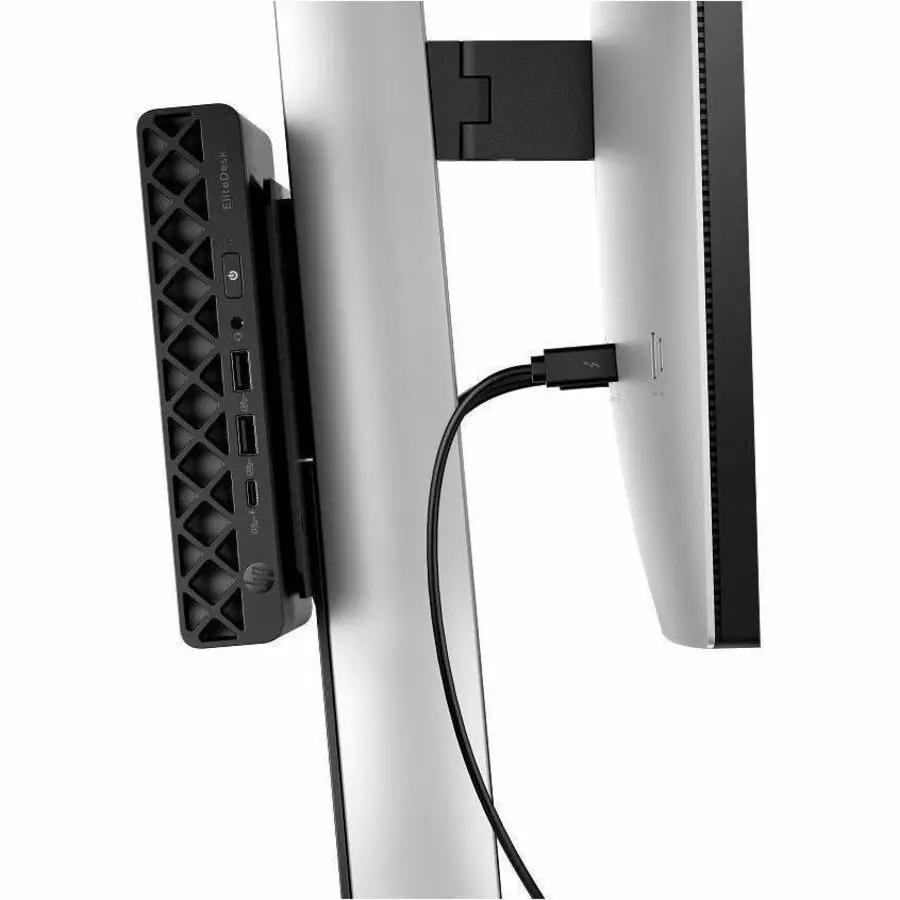 HP EliteDesk 8 Mini G1a Desktop computer, black compact mini tower mounted beside a monitor.