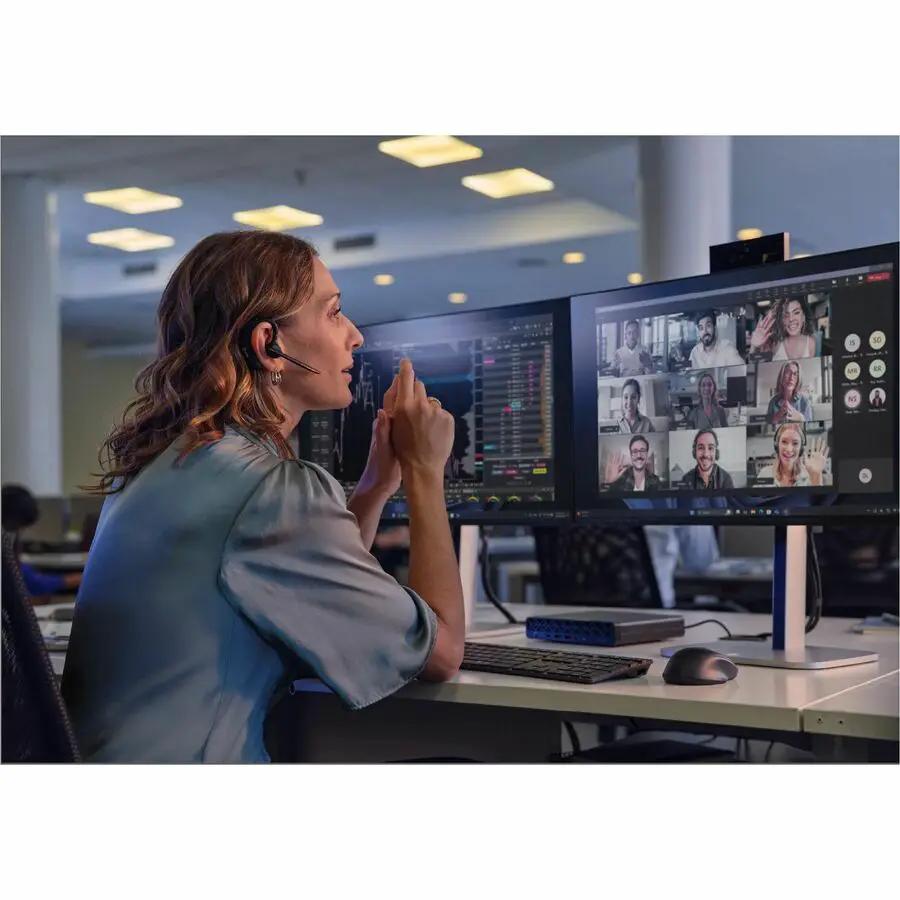 HP EliteDesk 8 Mini PC desk setup with dual monitors displaying a video conference
