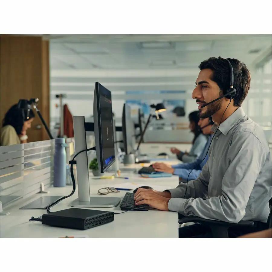 HP ProDesk 4 Mini G1i U5235T desktop PC, black compact mini PC on an office desk.
