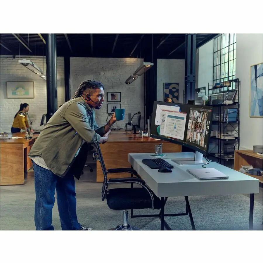 HP EliteDisplay 549pm 49-inch DQHD LED curved monitor on desk in an office